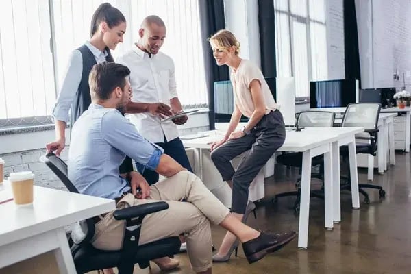 depositphotos_164167388-stock-photo-young-business-people-with-digital