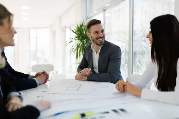 depositphotos_168296512-stock-photo-architects-working-together-on-project