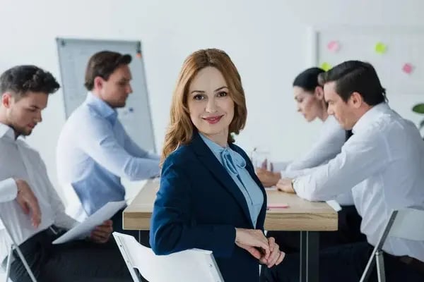 depositphotos_195979850-stock-photo-selective-focus-smiling-businesswoman-colleagues