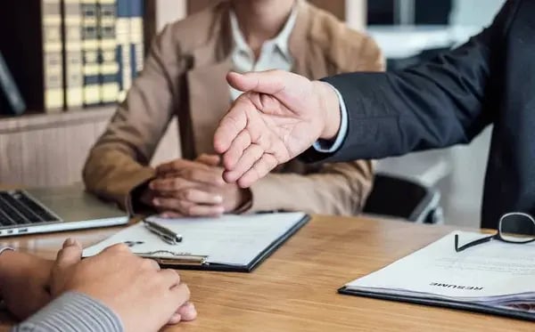 depositphotos_201727652-stock-photo-welcome-colleagues-two-senior-manager