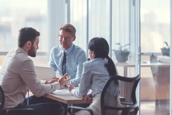 depositphotos_207123680-stock-photo-young-business-people-meeting-office