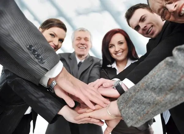 depositphotos_21530223-stock-photo-group-of-happy-smiling-executives