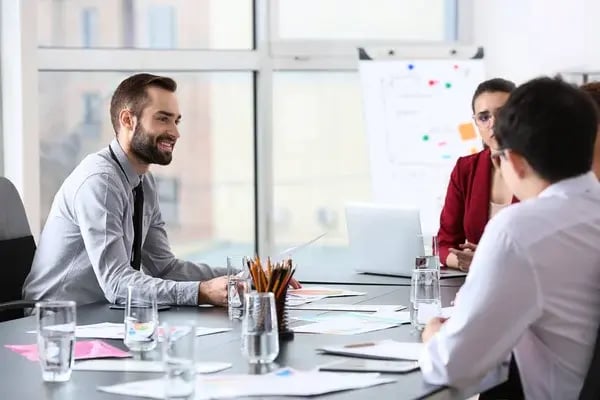 depositphotos_247659584-stock-photo-young-people-having-business-meeting