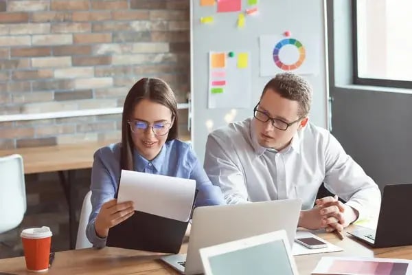 depositphotos_276210530-stock-photo-young-people-having-business-meeting