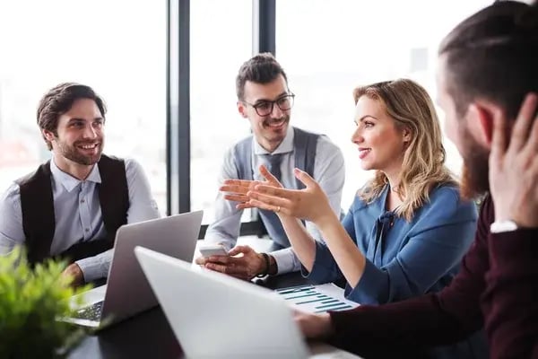 depositphotos_278031232-stock-photo-a-group-of-young-business