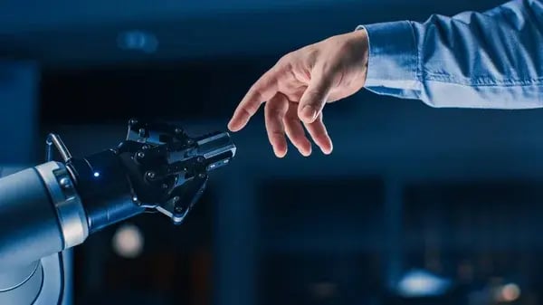 depositphotos_298983874-stock-photo-futuristic-robot-arm-touches-human