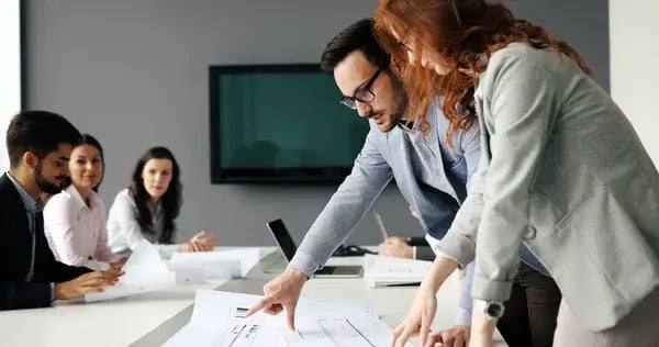 depositphotos_309905900-stock-photo-group-architects-business-people-working