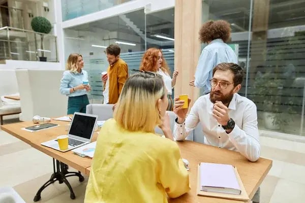 depositphotos_313446154-stock-photo-group-of-designers-brainstorming-at (1)
