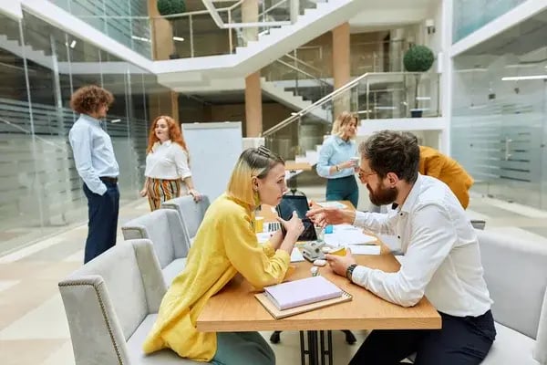 depositphotos_314688168-stock-photo-happy-designers-working-in-creative