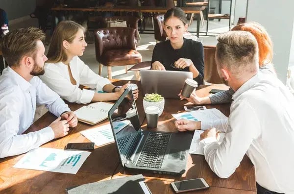 depositphotos_315191344-stock-photo-a-team-of-young-businessmen