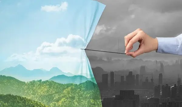 depositphotos_315192114-stock-photo-hand-pulling-nature-cityscape-curtain