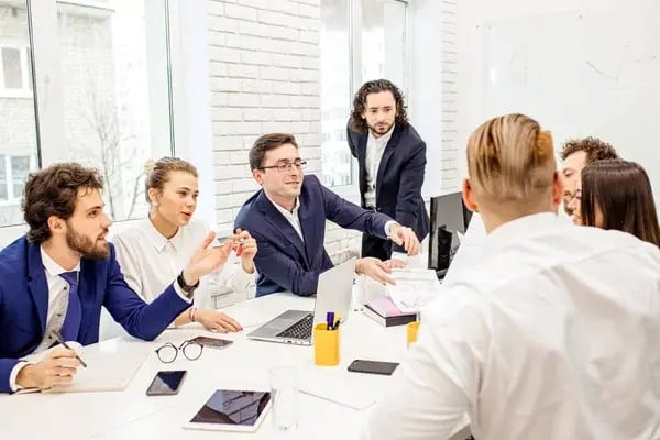 depositphotos_331390412-stock-photo-young-caucasian-business-people-in (1)