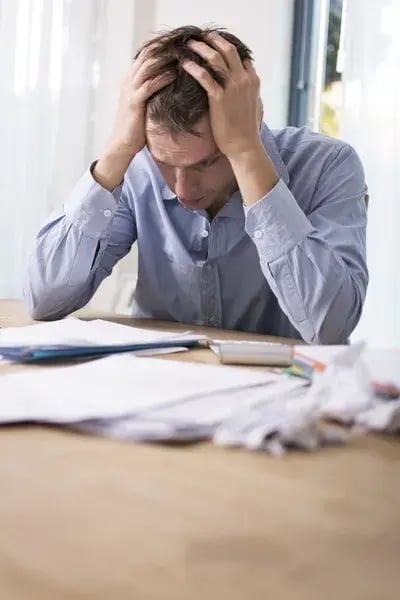 depositphotos_33515497-stock-photo-man-cant-pay-bills-in