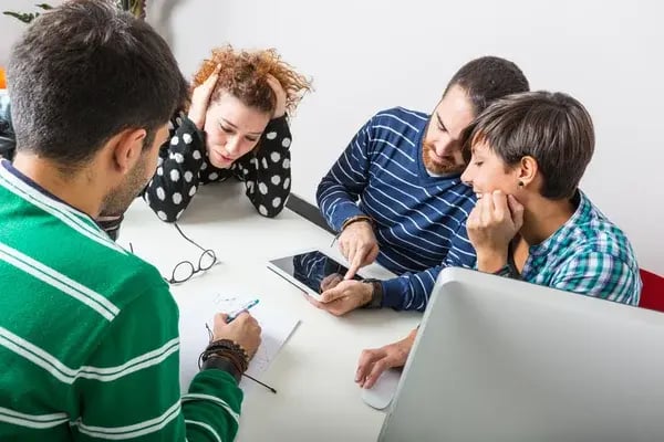 depositphotos_38329999-stock-photo-group-of-friends-studying