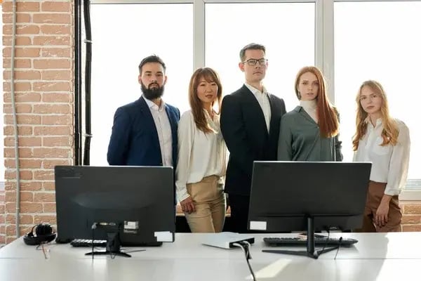 depositphotos_441514878-stock-photo-confident-serious-multi-ethnic-business