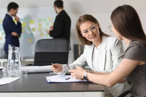 depositphotos_661751330-stock-photo-female-colleagues-working-business-plan