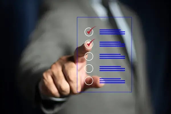 depositphotos_727227942-stock-photo-business-performance-checklist-businessman-doing