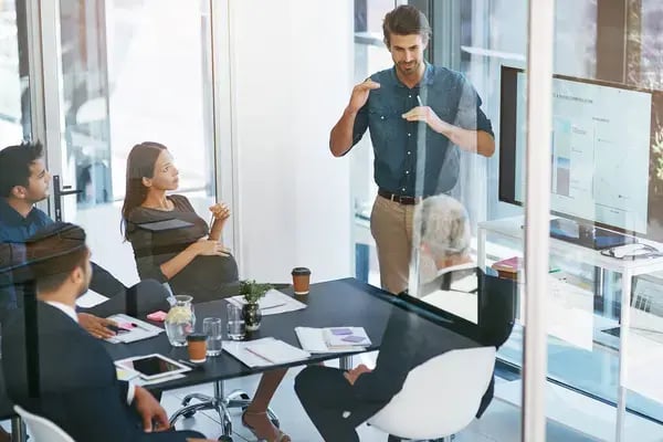 depositphotos_728465614-stock-photo-office-meeting-businessman-presentation-computer