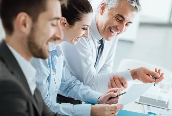depositphotos_80146312-stock-photo-business-team-discussing-on-paperwork