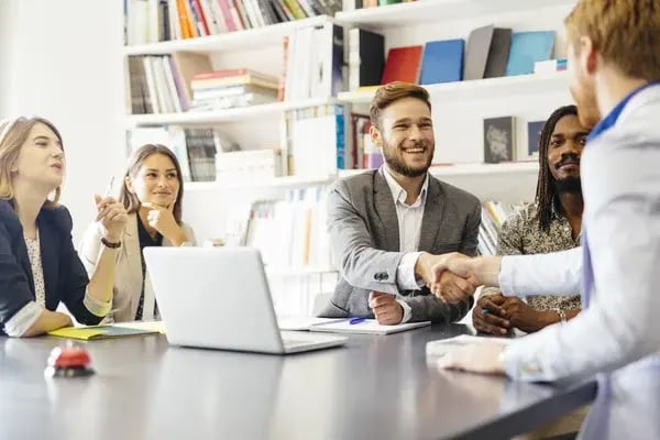 depositphotos_84683444-stock-photo-businessmen-shaking-hands